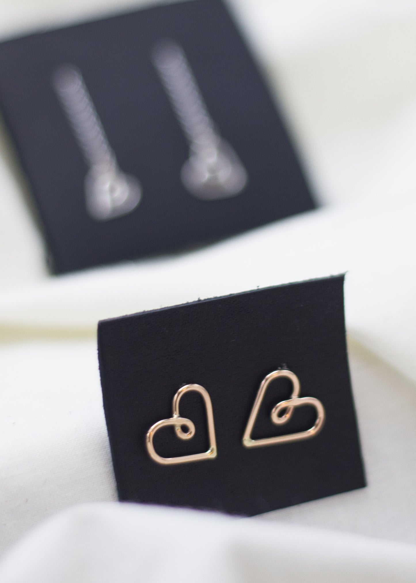twisty heart studs