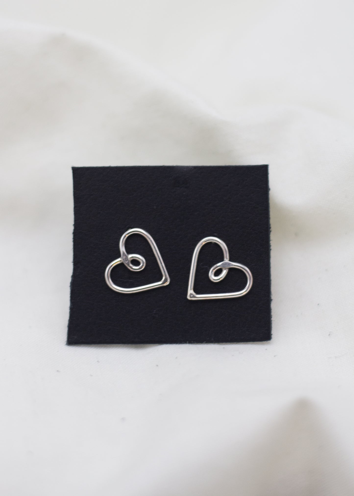 twisty heart studs